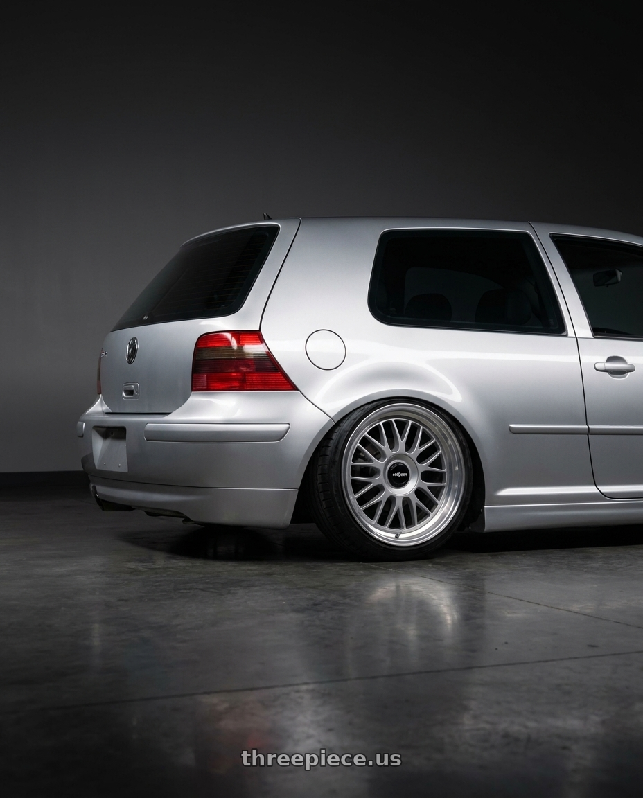 2002 VW GTI with Rotiform 1PC R170 DTM 5X100/5X112 18X8.5 +35 SILVER wheels rear three quarter view slight stretch tires