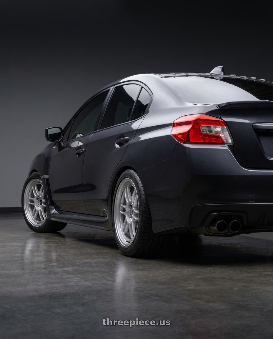 2016 Subaru WRX with Enkei RPF1 5x114.3 18x9.5+38 Silver wheels rear three quarter view square tires