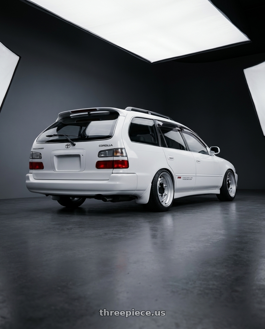 1993 corolla wagon with Mobelwagen MW520S Interceptor 5X205 15x5.5 20 Silver wheels rear three quarter view slight stretch tires