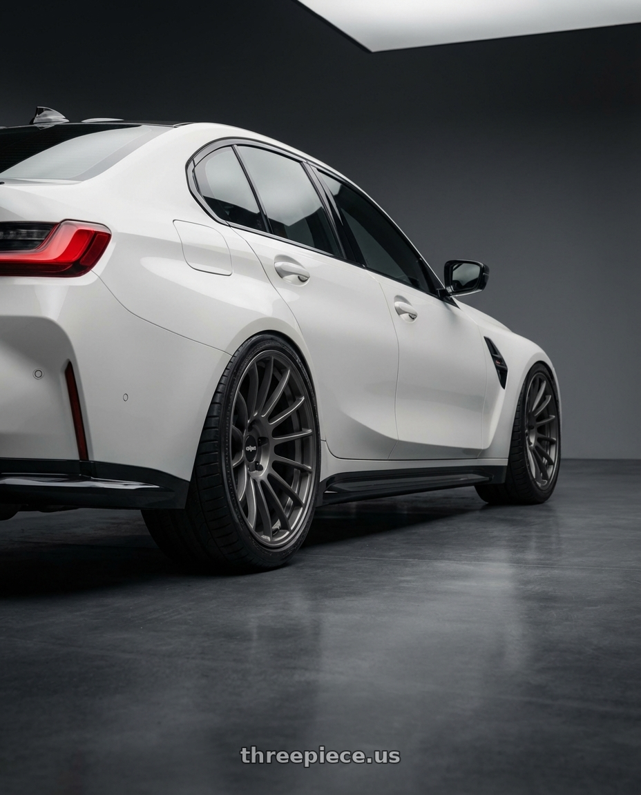 2024 bmw m3 comp x drive with Rotiform RC202 GRZ 5X112/5X120 20x10 +40 MATTE ANTHRACITE wheels rear three quarter view slight stretch tires