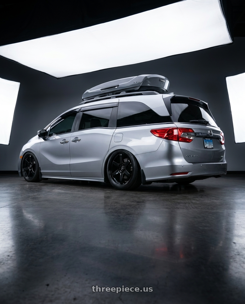2024 Honda Odyssey with Vors TR37 5x120 17x8 +35 Gloss Black wheels rear three quarter view extreme stretch tires