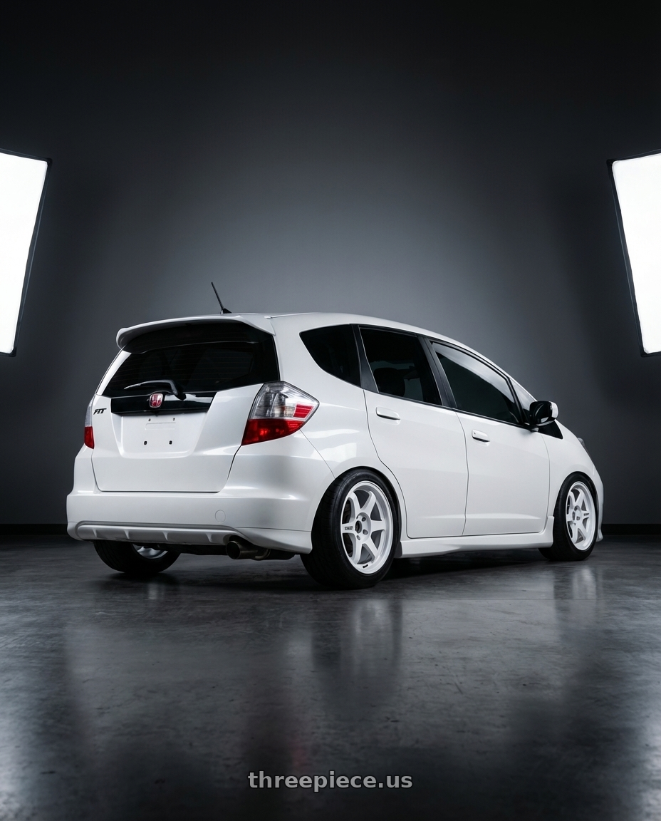 2013 Honda fit  with Volk Racing TE37SL 4x100 15x8 +25 DASH WHITE wheels rear three quarter view meaty tires