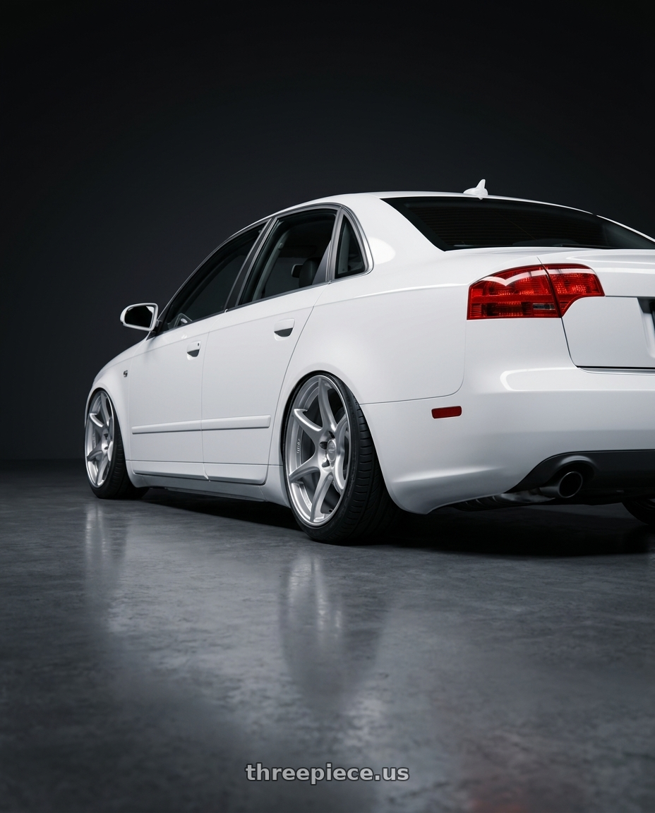 2010 Audi A4 B7 with Kansei K11S Tandem 5X112 19x10.5 22 Hyper Silver wheels rear three quarter view slight stretch tires