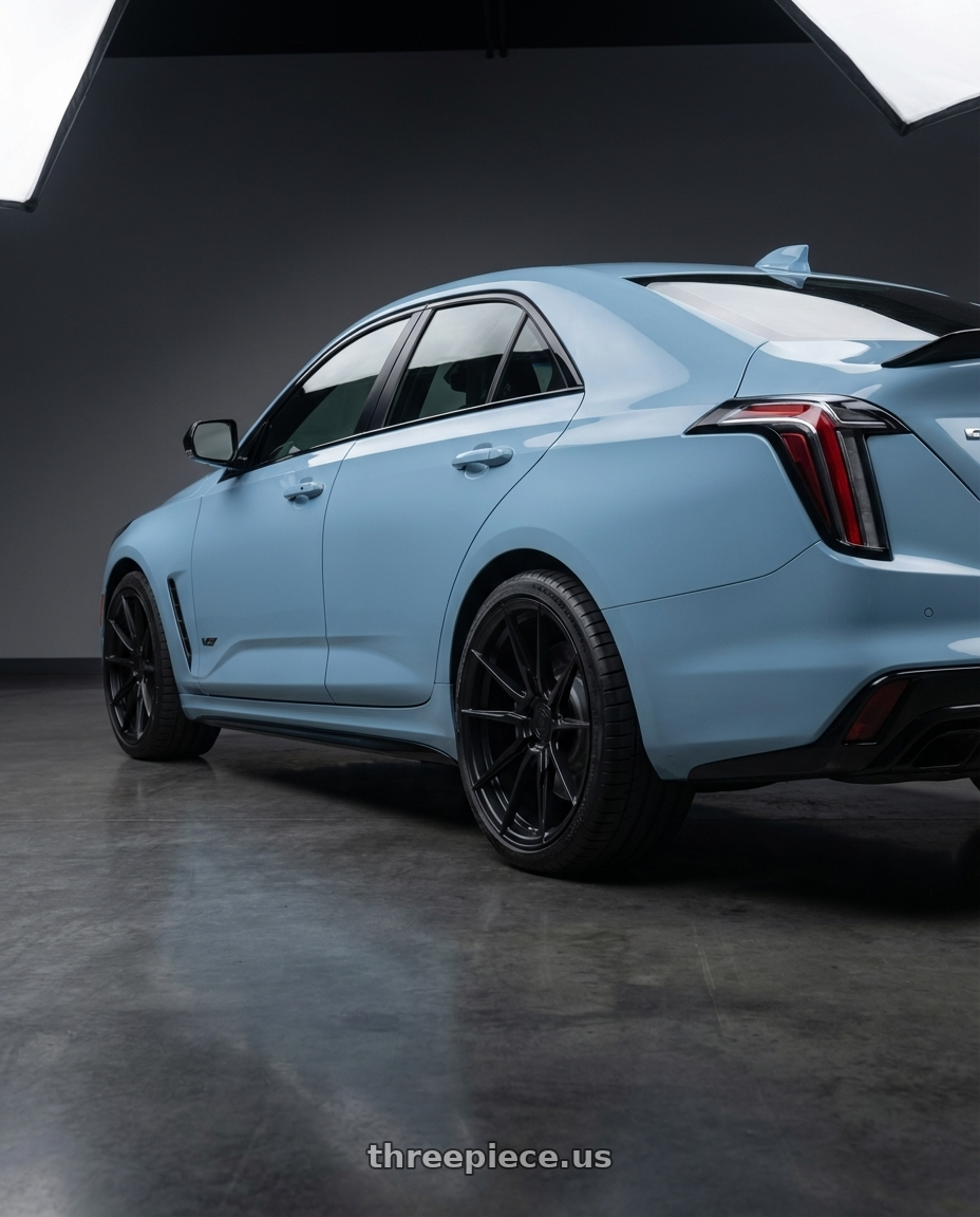 2026 Cadillac ct4v blackwing with Rohana RFX2 5x120 19x9.5+35 Matte Black wheels rear three quarter view square tires