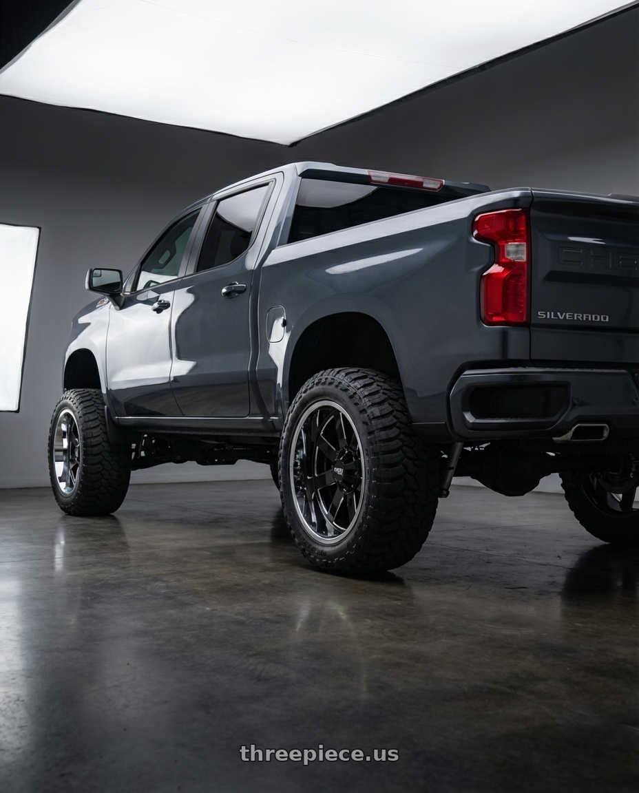 2023 Chevrolet Silverado 1500 with Moto Metal MO200 6X139.7 22X12 -44 GLOSS BLACK MILLED CENTER CHROME LIP wheels rear three quarter view meaty tires