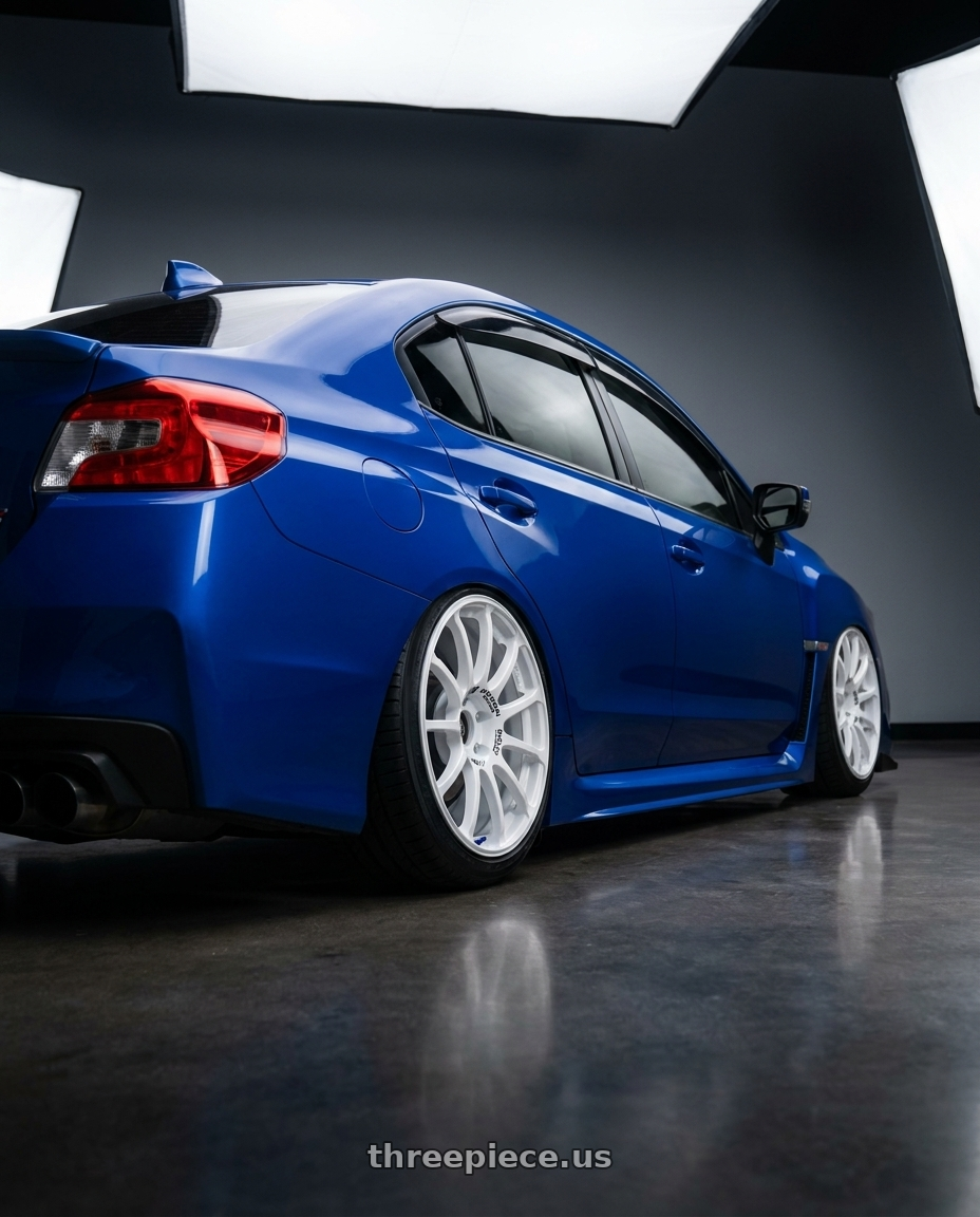 2018 Subaru WRX STI with Advan RCIII 5x114.3 18x8.5+38 White wheels rear three quarter view slight stretch tires