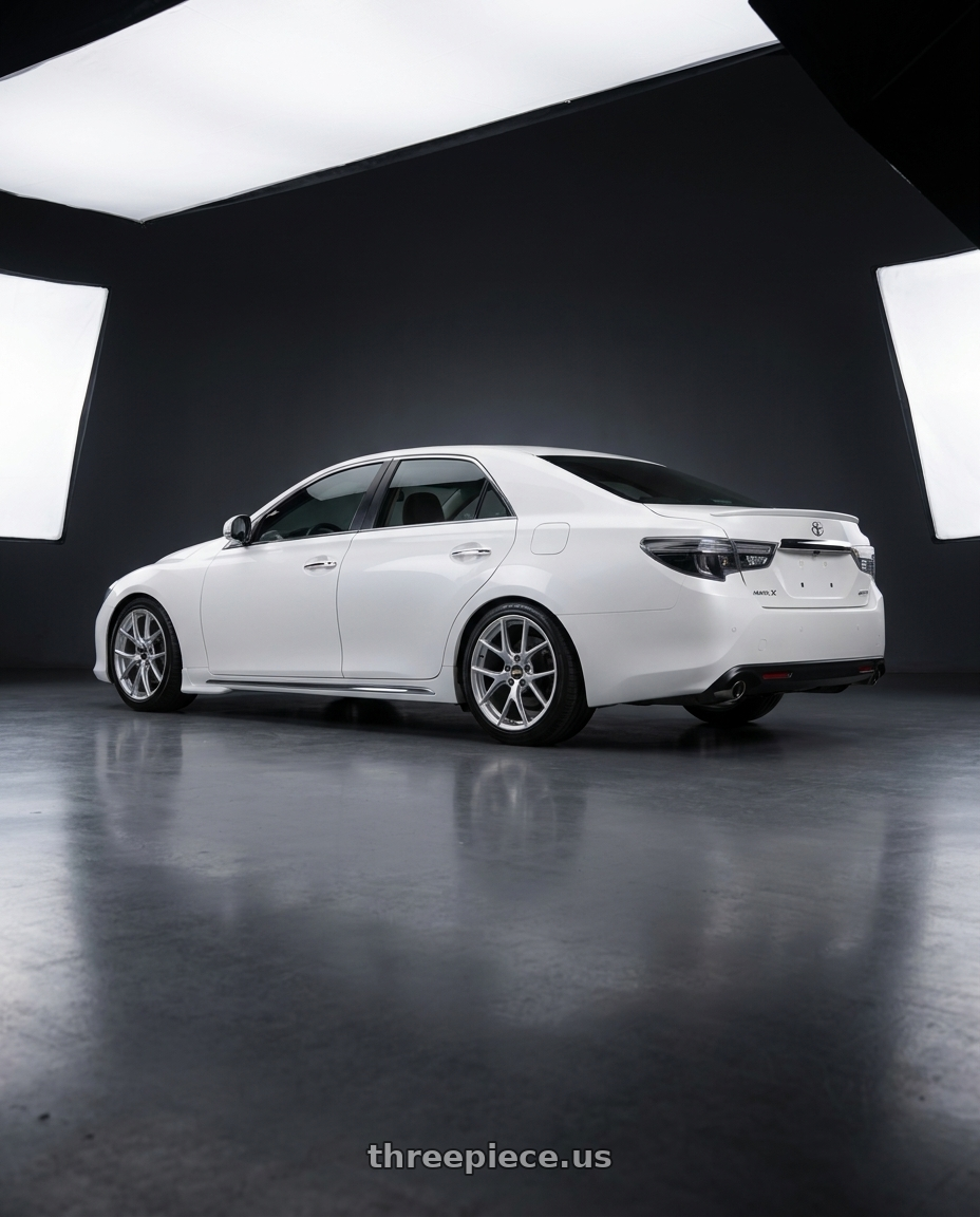 2014 Toyota Mark X with BBS RE-V7 5x114.3 18x8.5 +35 Diamond Silver wheels rear three quarter view square tires