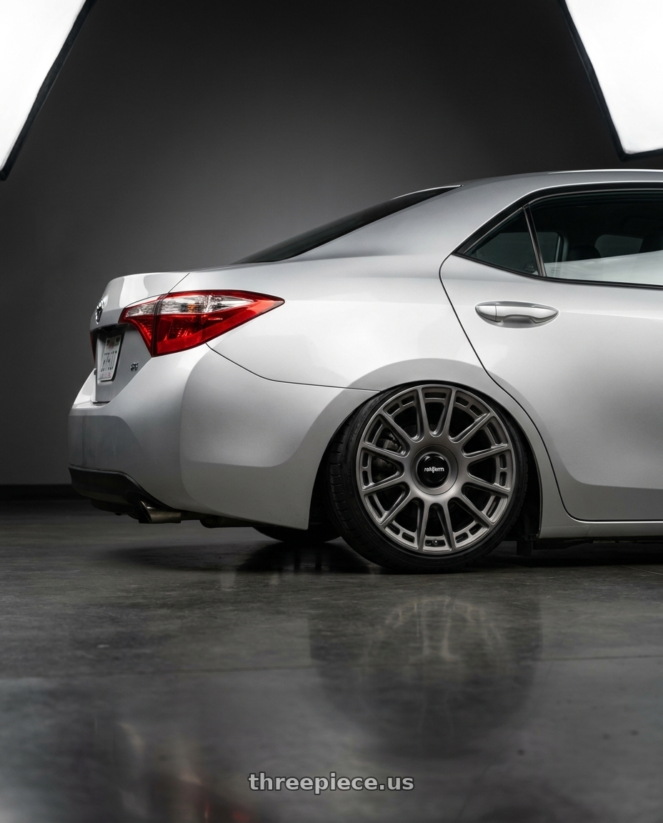 2016 Toyota corolla with Rotiform 795 5x114.3 22x9 +38 MATTE ANTHRACITE wheels rear three quarter view slight stretch tires