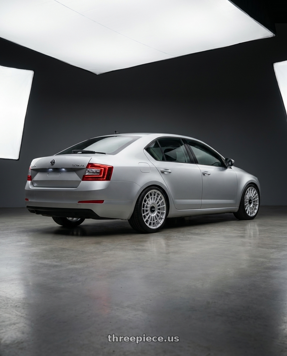 2015 Skoda Octavia with Rotiform 1PC R134 FLG 5X120 18X8.5 +35 GLOSS SILVER wheels rear three quarter view square tires