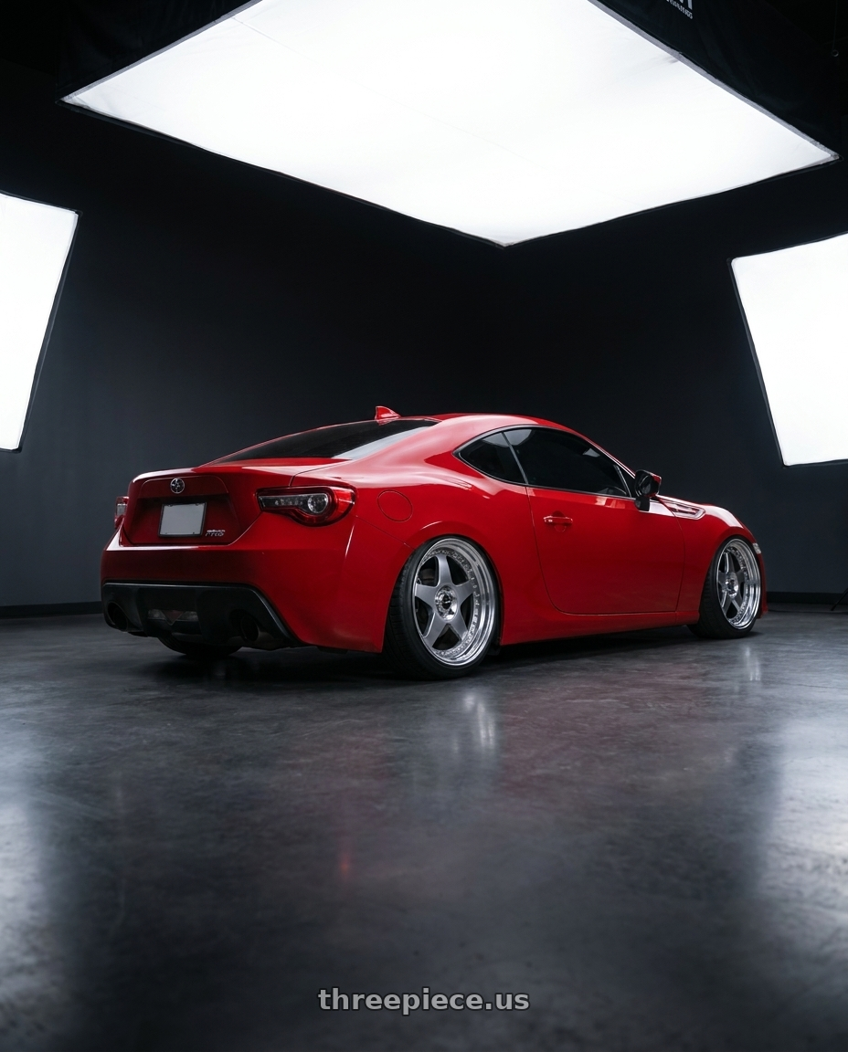 2015 Scion FRS with SSR Professor SP6 5x100 18X9.5+30 NR Disk Titan Silver wheels rear three quarter view square tires