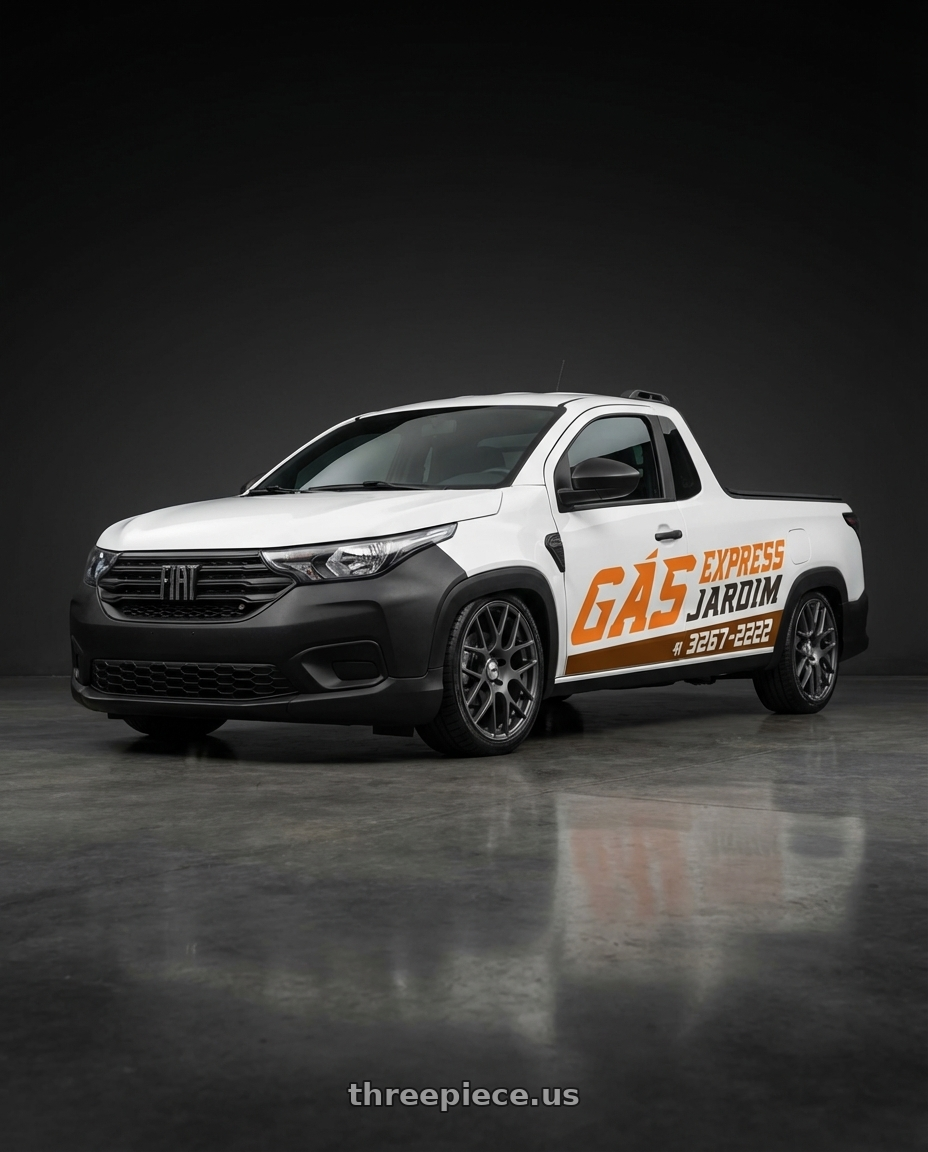 fiat strada endurance branca 2025  adesivada e parachoques preto with TSW NURBURGRING 5X114.3 17X7.5 +45 MATTE GUNMETAL wheels