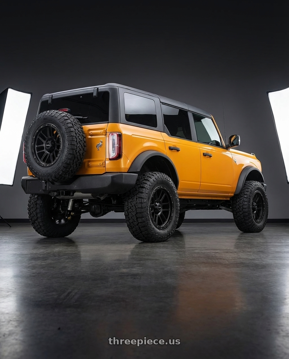 2024 Ford Bronco with Vision Off-Road 111 Nemesis 6x139.7 20x9+12 Matte Black wheels rear three quarter view meaty tires