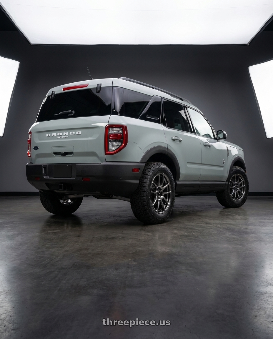 2025 Ford Bronco Sport Outer Banks with Vors TR4 5x108 17x8  +35 Hyper Black wheels rear three quarter view meaty tires
