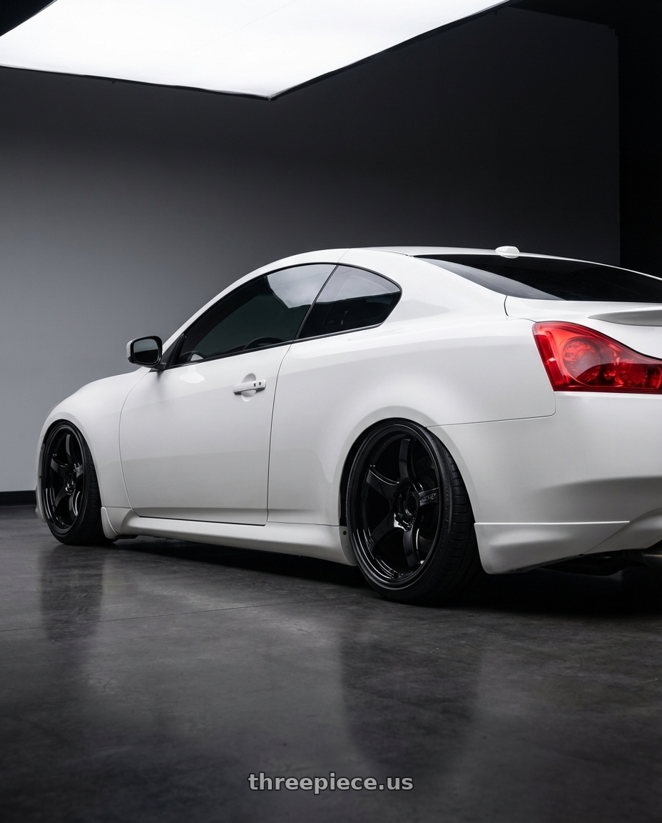 2014 Infiniti G37 Coupe with Gram Lights 57CR 5x114.3 19x8.5+45 Glossy Black wheels rear three quarter view slight stretch tires