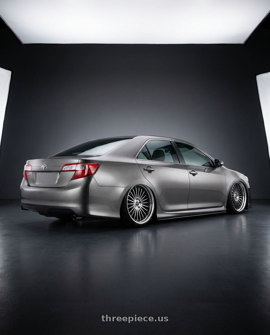 2012 Toyota camry metallic gray with Work Emitz Black Polish 5x114.3 19x7.5 +18 wheels rear three quarter view slight stretch tires