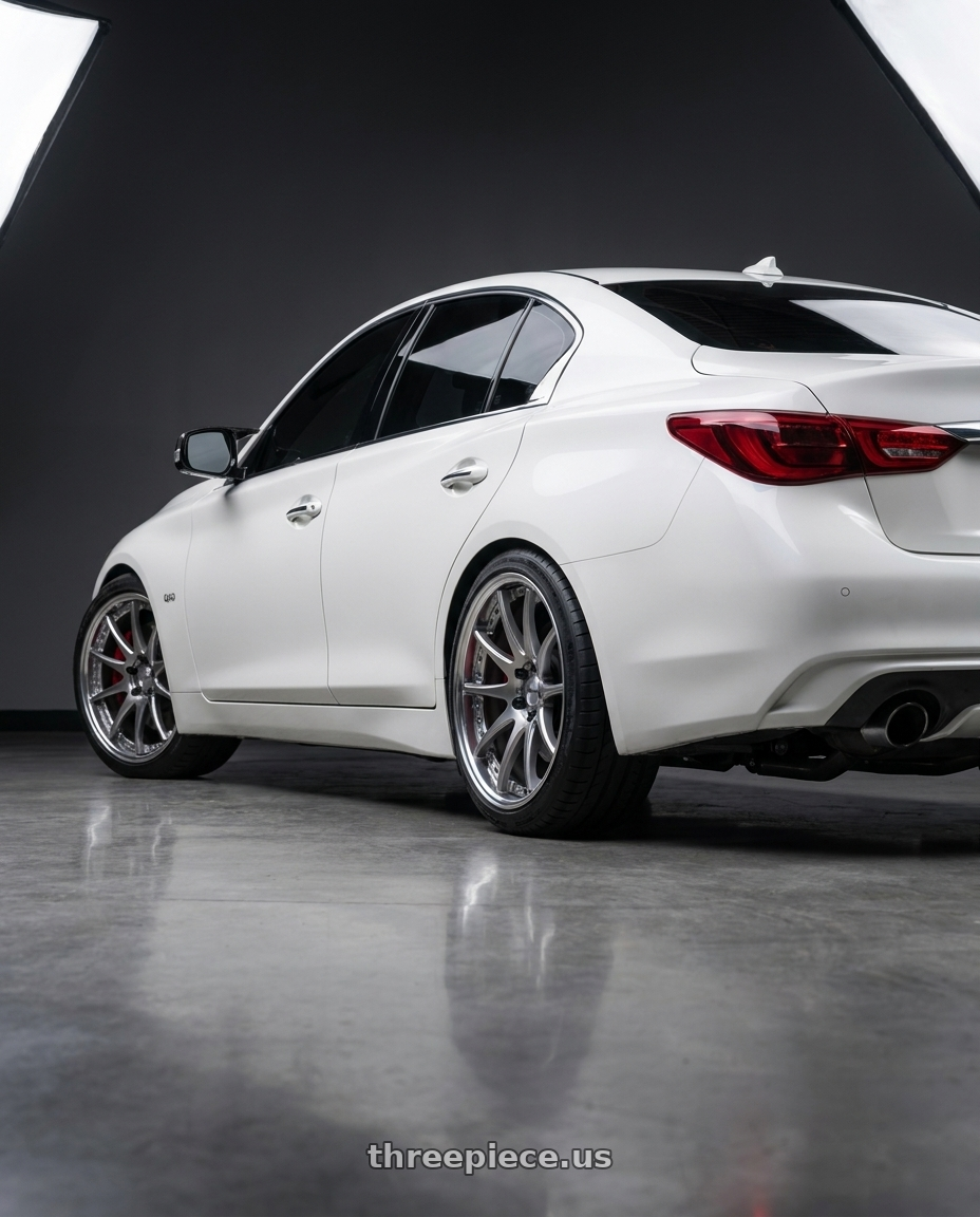 2021 Q50 redsport  with Work Emotion Cr 3P 5x114.3 21x9-1 L Disk Burning Silver wheels rear three quarter view square tires