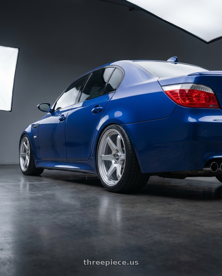 2010 BMW M5 E60 with ESR Wheels APEX SERIES AP6 5x120 19x8.5 +30 Hyper Silver wheels rear three quarter view square tires