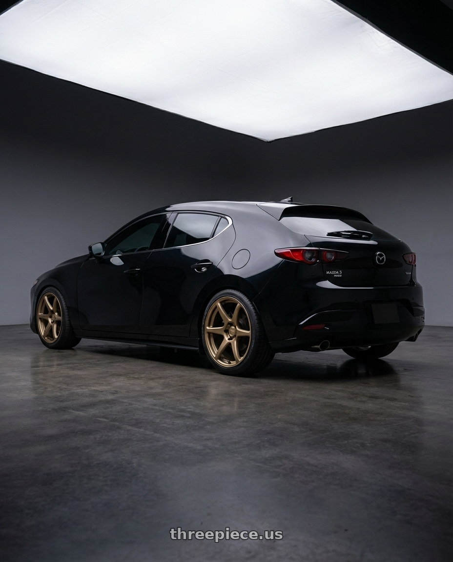 2026 Mazda 3 Turbo Hatchback with Kansei K11B Tandem 5X100 18x10.5 12 Bronze wheels rear three quarter view square tires