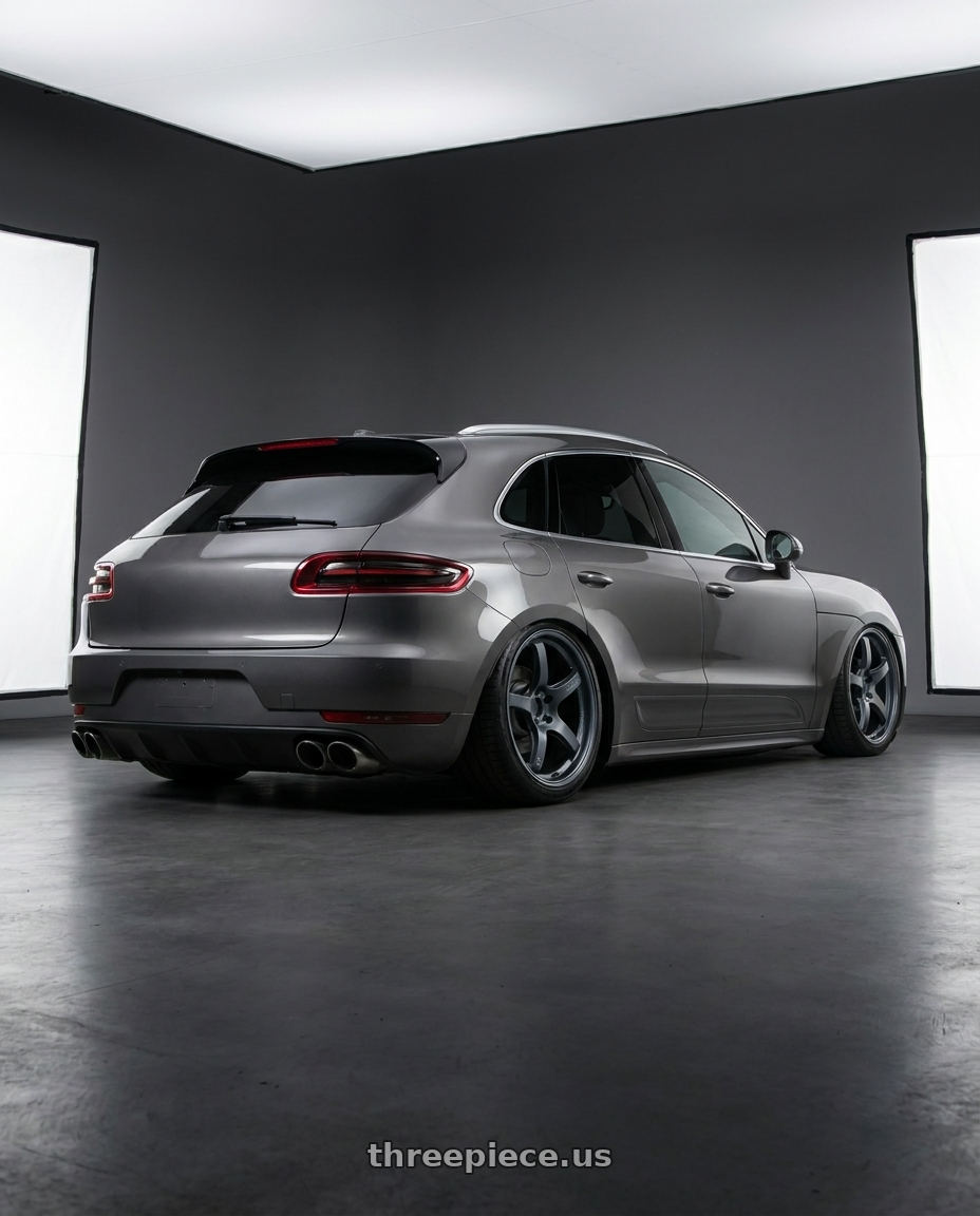2015 Macan Turbo with Gram Lights 57CR 5x112 19x10.5+35 Gunblue II wheels rear three quarter view slight stretch tires