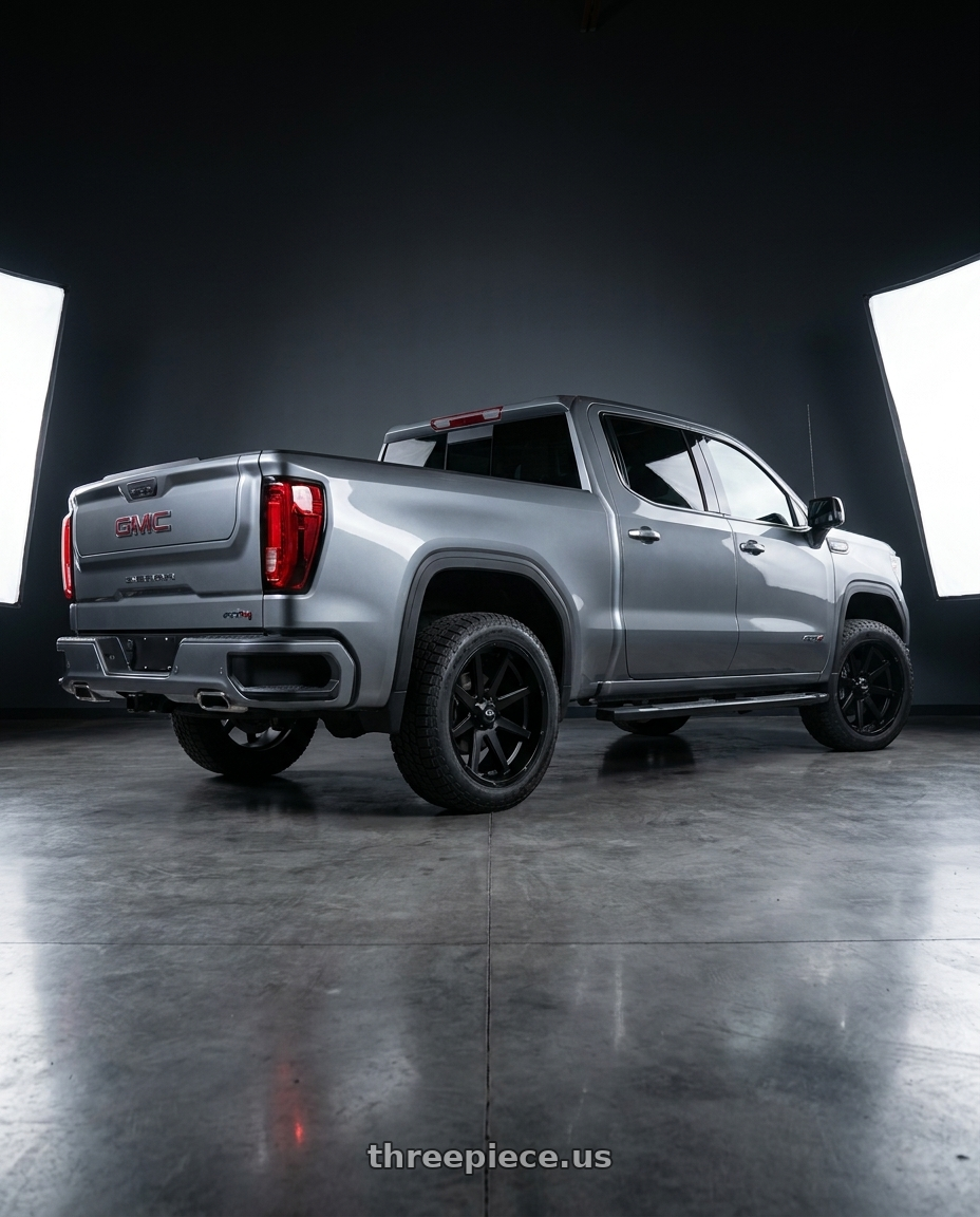 2021 GMC Sierra 1500 AT4 with Ion Type 143 6x139.7 20x9+0 Matte Black wheels rear three quarter view square tires