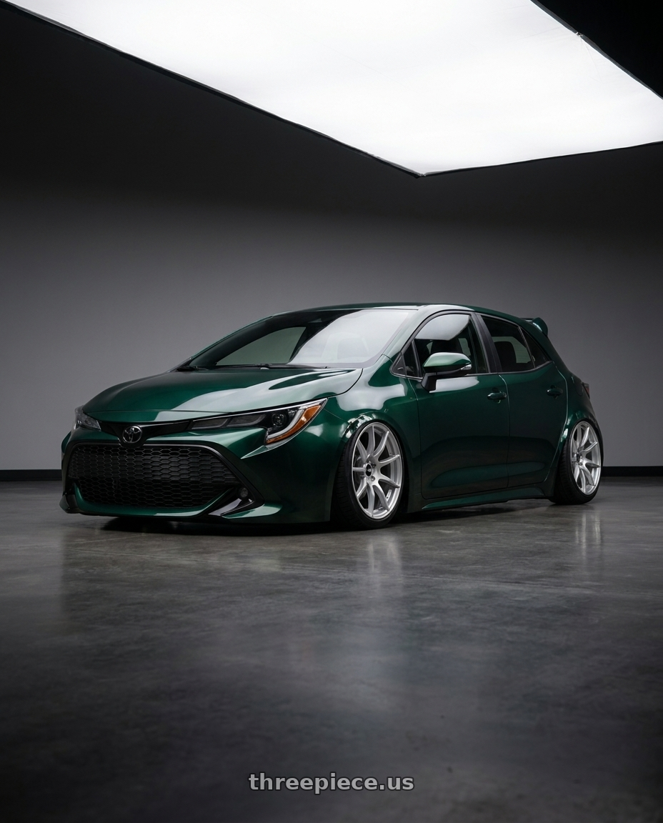 2019 Corolla hatch se with spoiler wrapped dark emerald green with Enkei TS9 5x100 17x9+45 Silver Paint wheels