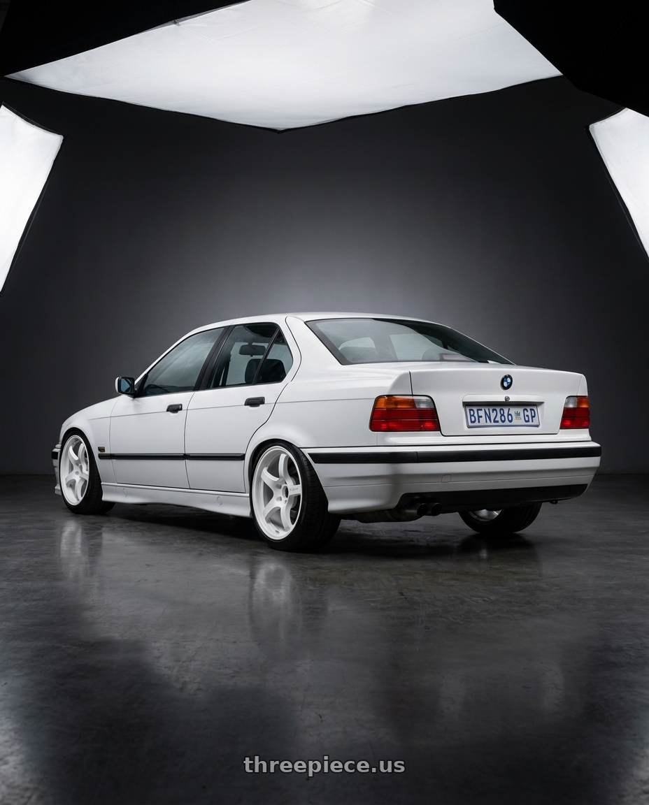 1996 BMW E36 with Gram Lights 57CR 5x114.3 19x9.5+45 Ceramic Pearl wheels rear three quarter view square tires