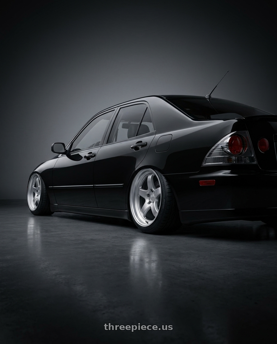2004 Lexus IS300 with Kansei K15H Astro 5x114.3 18x9 22 Hyper Silver wheels rear three quarter view slight stretch tires
