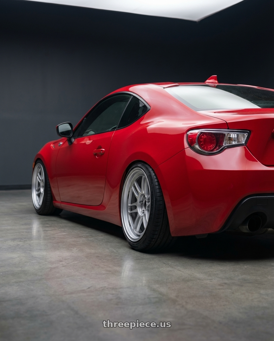 2013 Scion FR-S with Enkei RPF1 5x100 17x9+35 Silver wheels rear three quarter view extreme stretch tires