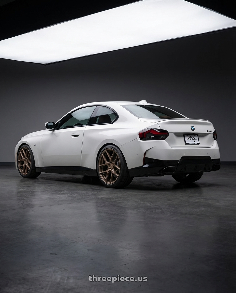 2024 BMW 2 Series G42 with Aodhan AFF2 5x112 19x9.5+35 Matte Bronze wheels rear three quarter view square tires