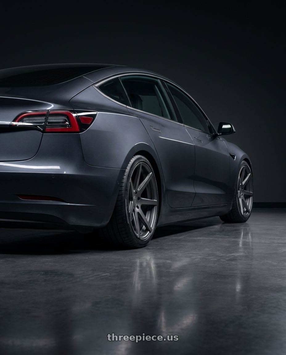 2023 tesla model 3  with Rohana RC7 5x114.3 19x8.5+35 Matte Graphite wheels rear three quarter view square tires