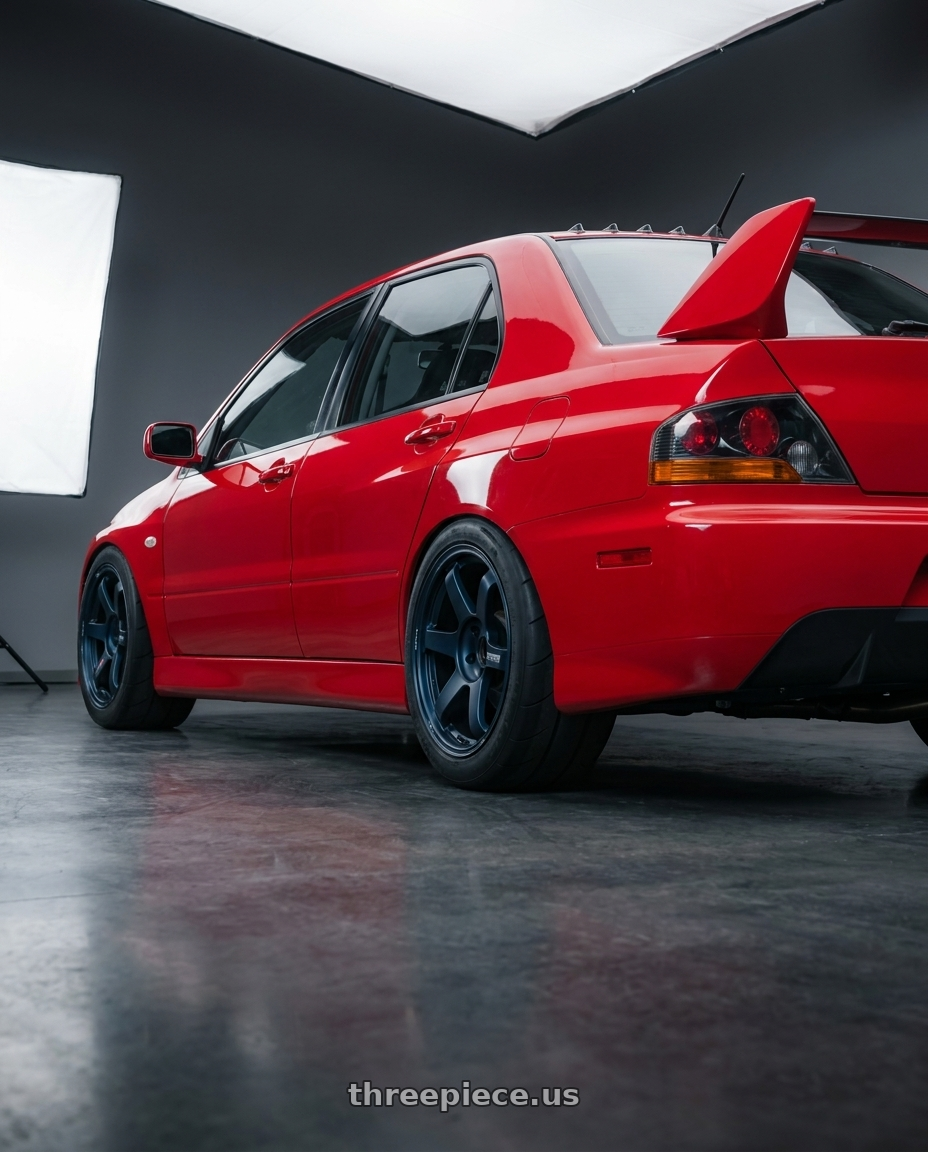 2003 Mitsubishi lancer evolution with Volk Racing TE37 SAGA S-PLUS 5x114.3 15x8+35 Mag Blue wheels rear three quarter view excessive tires