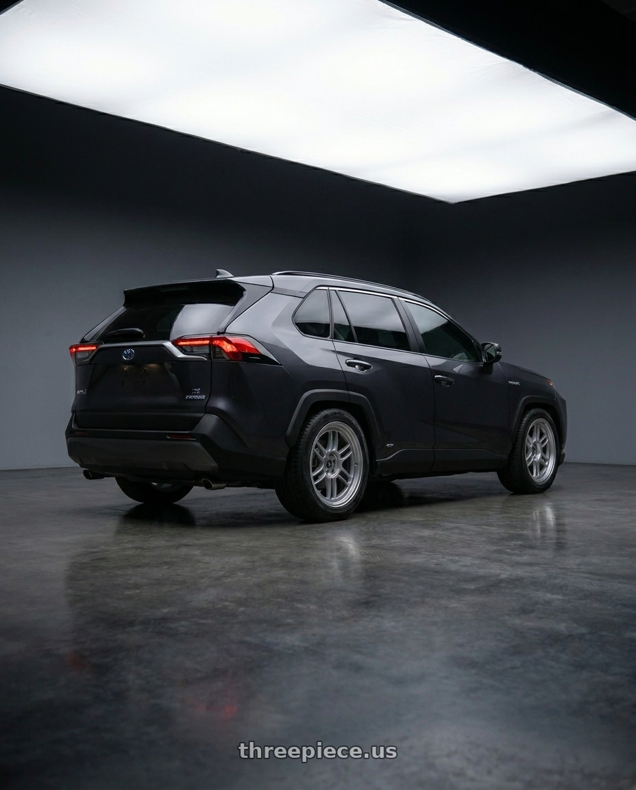 2019 toyota rav4 with Enkei RPF1 5x114.3 18x8.5+40 Silver wheels rear three quarter view square tires