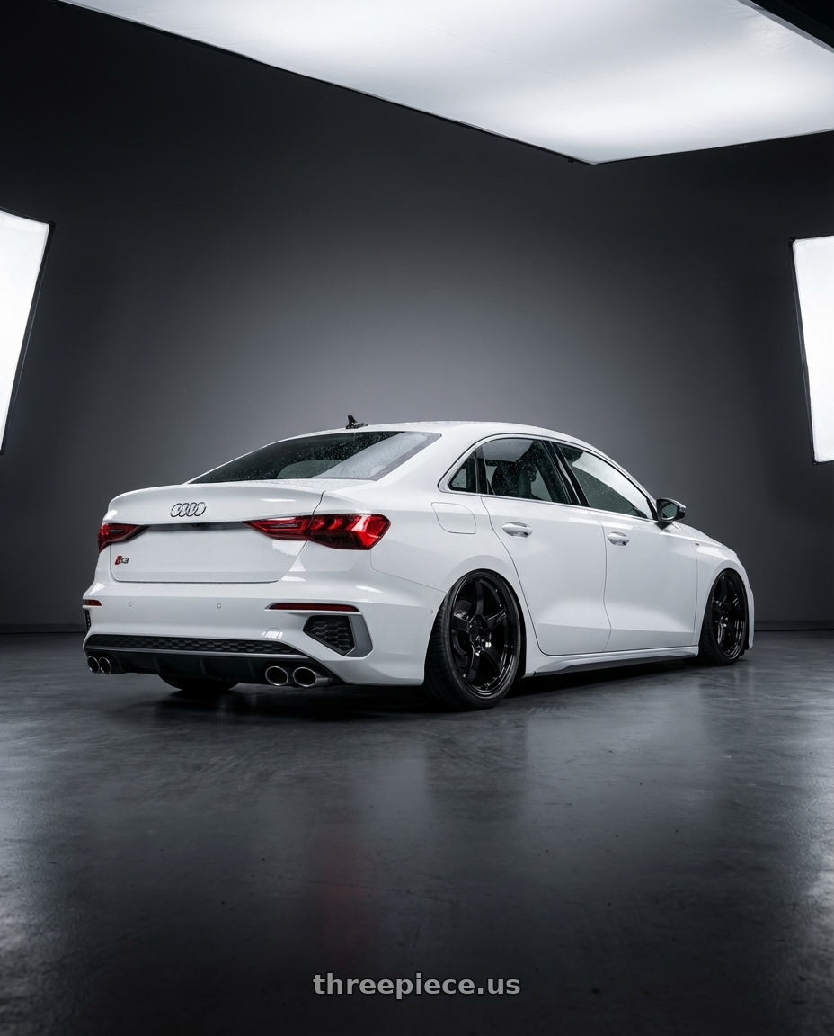 2024 Audi S3 8Y with Gram Lights 57CR 5x112 19x9.5+25 Glossy Black wheels rear three quarter view slight stretch tires