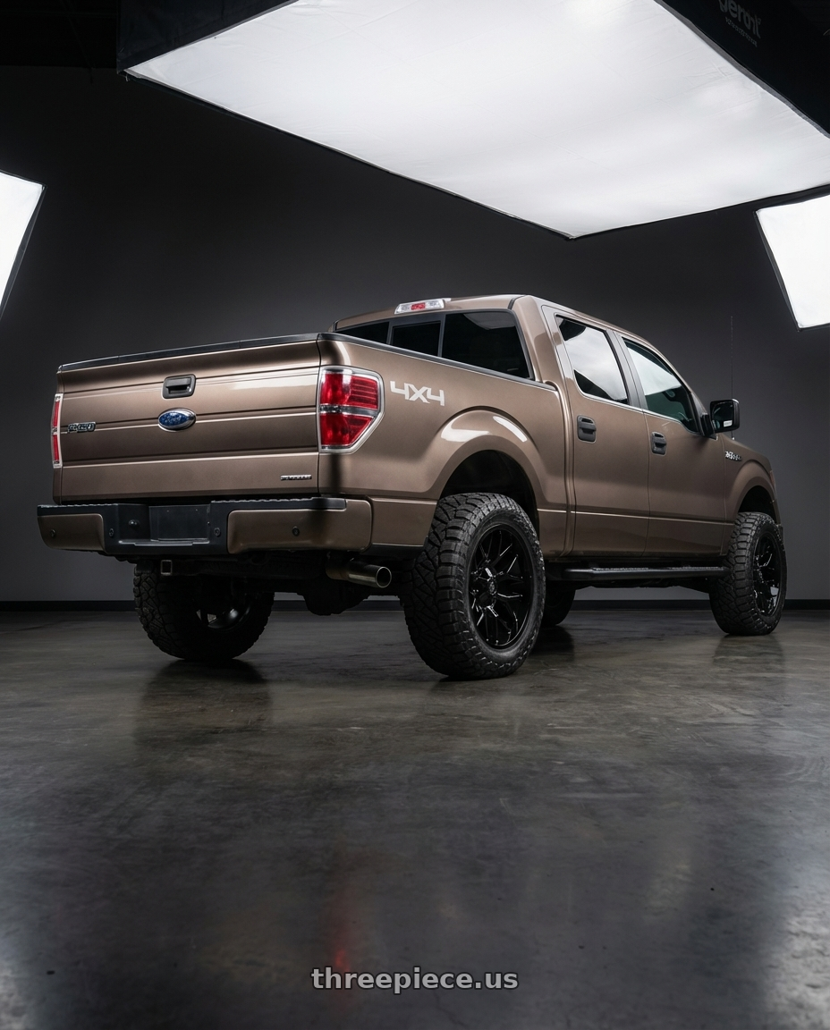 2013 Ford F-150 with Gear Off Road 768B 6X135/6x139.7 20x10 -19 Gloss Black wheels rear three quarter view meaty tires