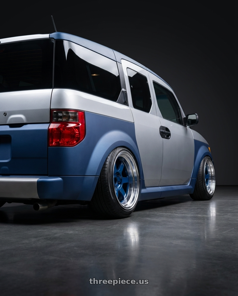 2006 Honda Element with Volk Racing TE37V 5x114.3 17x9.5 +15 MAG BLUE wheels rear three quarter view extreme stretch tires