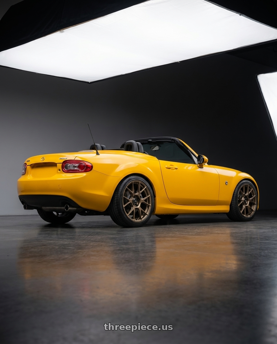 2013 Mazda MX-5 NC Miata with Konig Ampliform 5x114.3 17x8+40 Gloss Bronze wheels rear three quarter view square tires