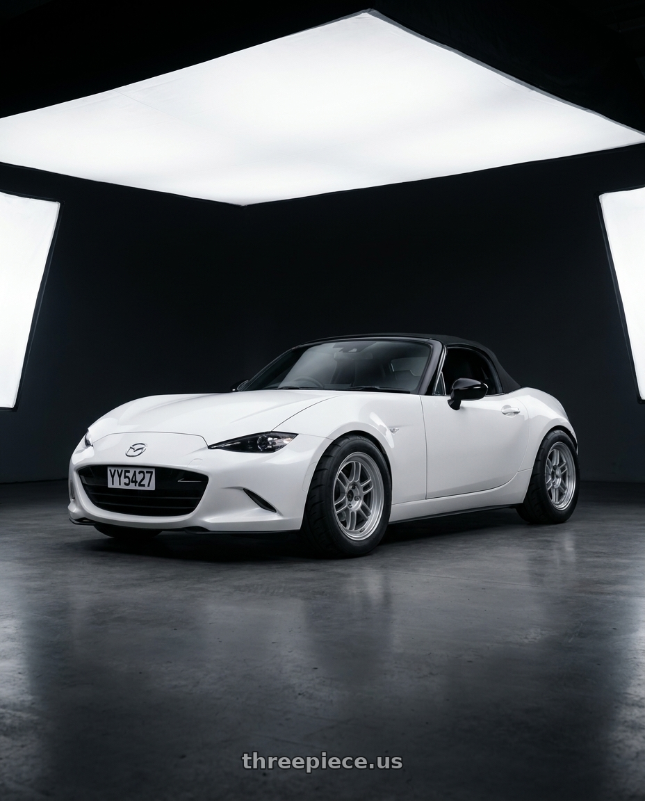 2024 nd mx5 soft top with Enkei RPF1 4x100 15x8+28 Silver wheels