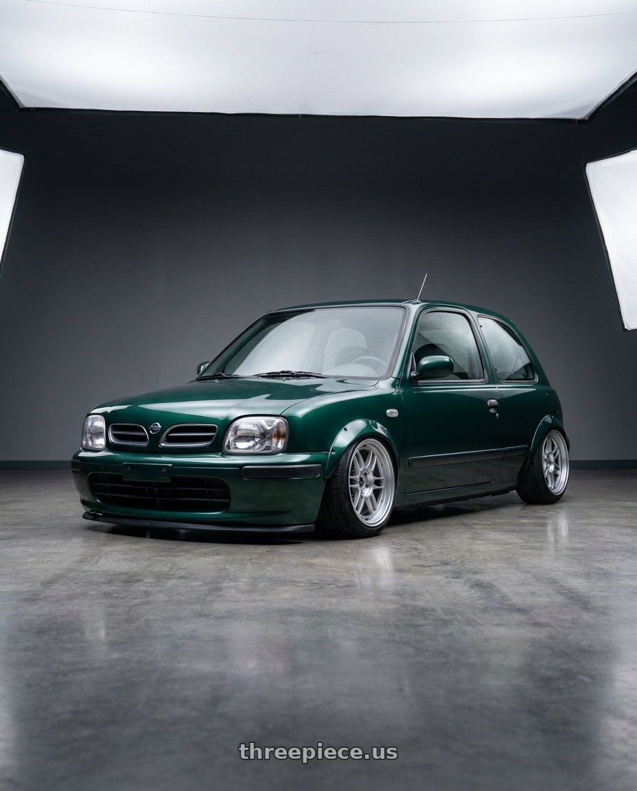 2001 Nissan march british green with Enkei RPF1 4x100 15x7+35 Silver wheels