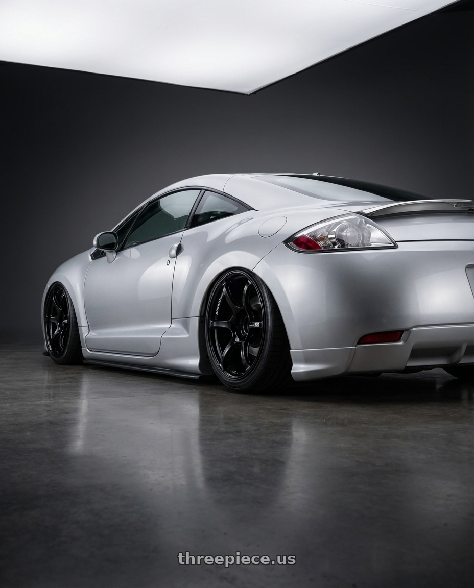 2010 Mitsubishi Eclipse with Advan RGIII 5x114.3 19x9.0+25 Gloss Black wheels rear three quarter view slight stretch tires