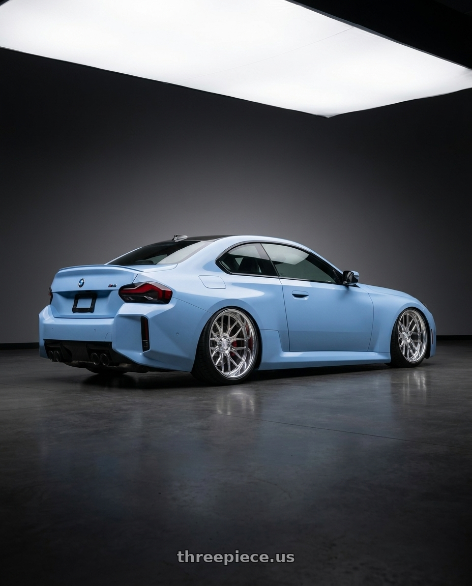 2024 Bmw m2 with Axe AF6 Forged 8x170 22X12 -44 FULLY POLISHED wheels rear three quarter view slight stretch tires