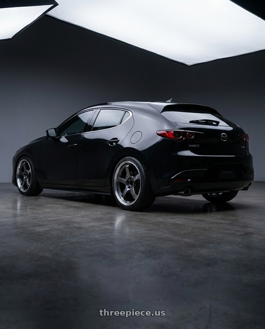 2023 mazda 3 with Advan Racing GT BEYOND 5x114.3 19x8.5 +45 MACHINING & HYPER PLATINUM BLACK wheels rear three quarter view square tires