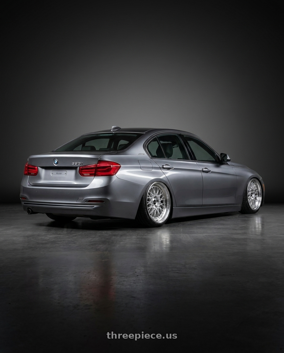 2017 Bmw 330i xdrive metallic grey with ARC AR1 5x114.3 17x8.5  +35 Silver Machine Face Lip Chrome Rivet wheels rear three quarter view slight stretch tires
