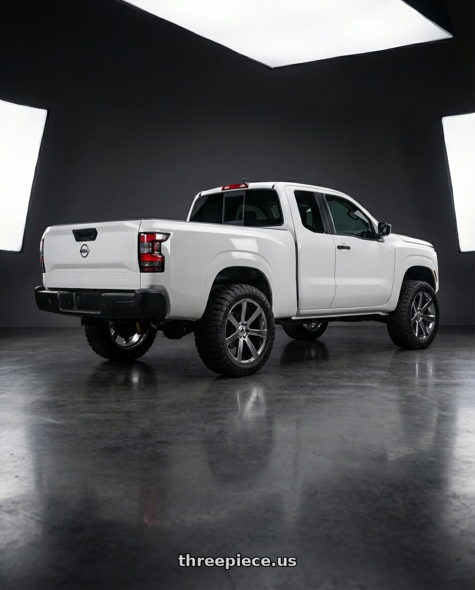 2025 Nissan Frontier kingcab white  with Asanti Black ABL-15 APOLLO 6X139.7 24X9 +15 CHROME wheels rear three quarter view meaty tires