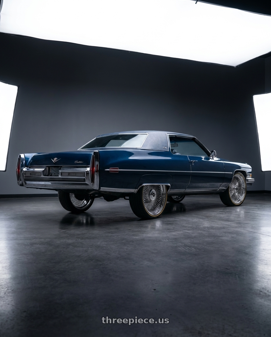 1973 Coupe Deville  with Amani AMA-603 5x120/5x127 26x10 +5 Chrome wheels rear three quarter view extreme stretch tires