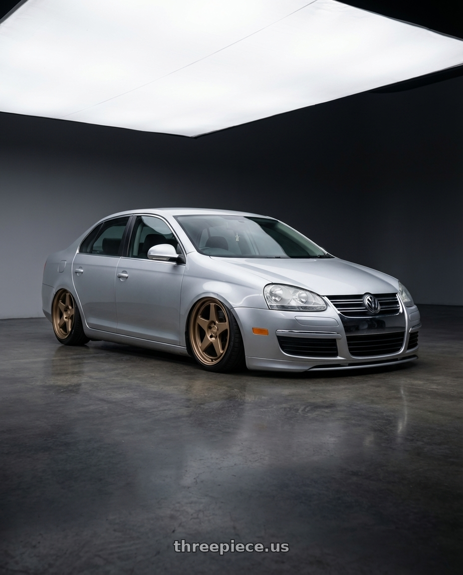 2009 Volkswagen Jetta GLI MK5 with Kansei K12B KNP 5X112 18x8.5 35 Bronze wheels