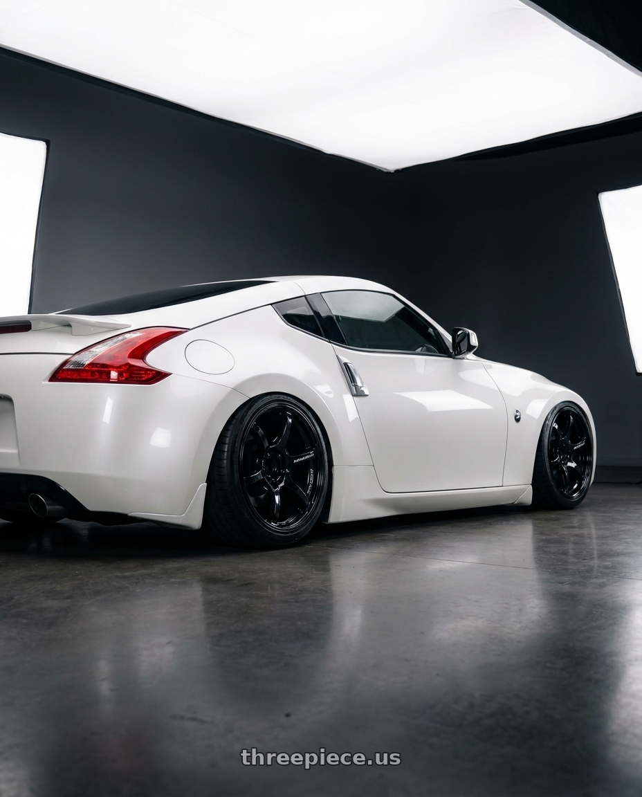 2019 Nissan 370Z with Advan RGIII 5x114.3 19x9.0+25 Gloss Black wheels rear three quarter view slight stretch tires