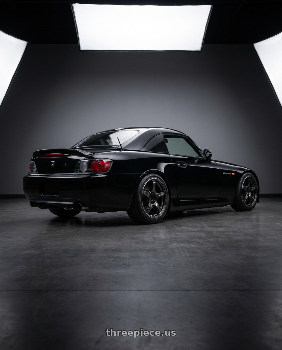 2000 honda s2000 with Advan Racing TC4 5x114.3 17x8.0 +45 BLACK GUNMETALLIC & RING wheels rear three quarter view square tires