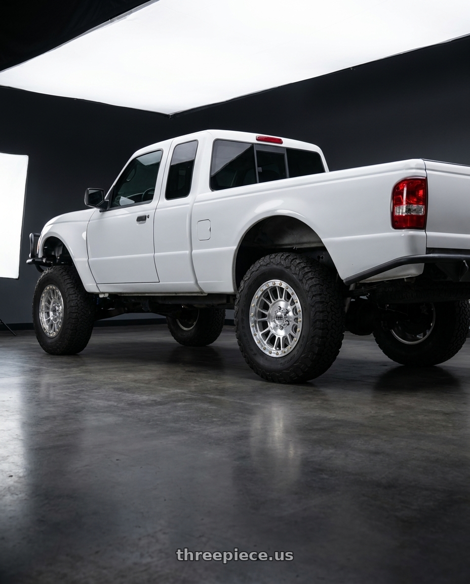 2005 ford ranger xl extended with KMC Powersports IMPACT UTV BEADLOCK 5x114.3 15x8 +0 Machined wheels rear three quarter view square tires