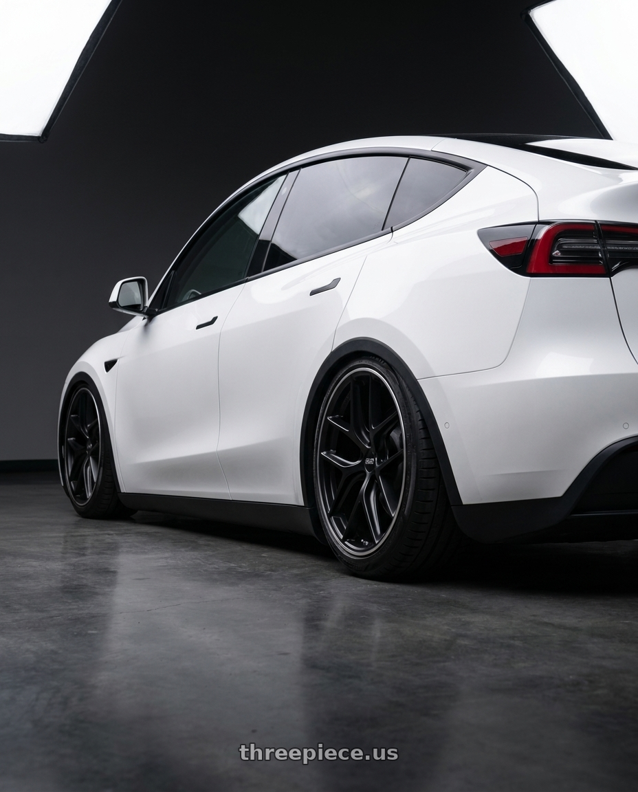 2024 Tesla Model Y with BBS CC-R 5x114.3 20x9.5+35 Satin Black wheels rear three quarter view slight stretch tires