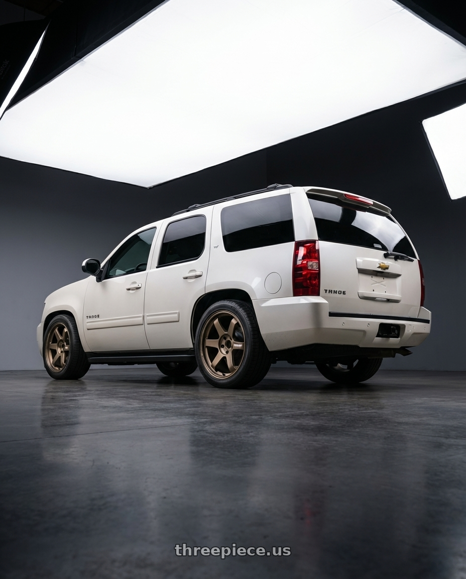 2011 Chevy Tahoe  with Volk Racing TE37 Ultra M Spec 5x112 19x9.5+23 19x10.5+35 Bronze Almite Toyota Supra MK5 Spec wheels rear three quarter view slight stretch tires